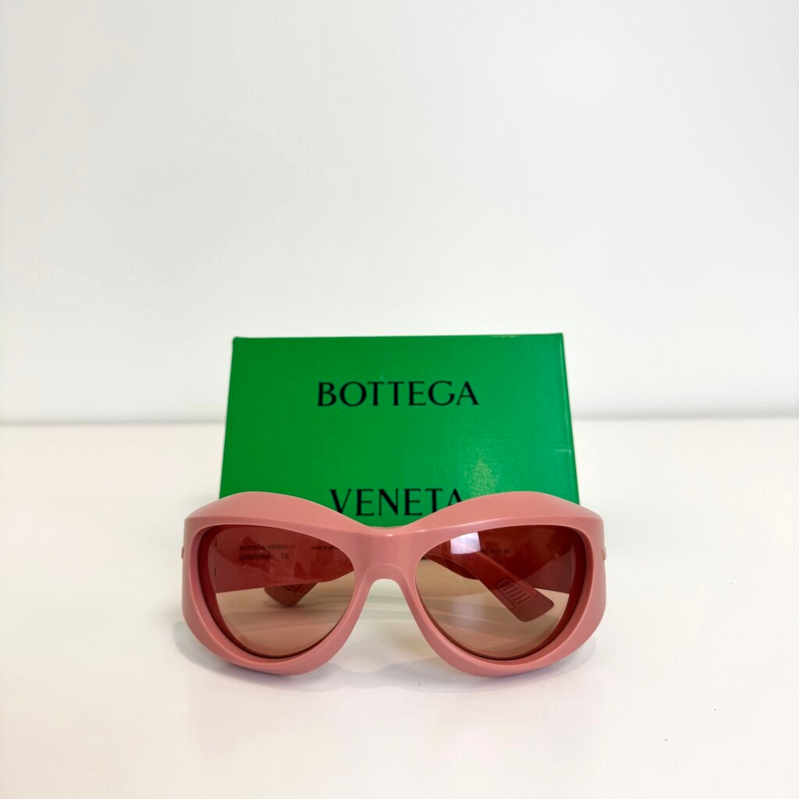 Bottega Veneta Pink Injection Wrap-Around Cat Eye Sunglasses